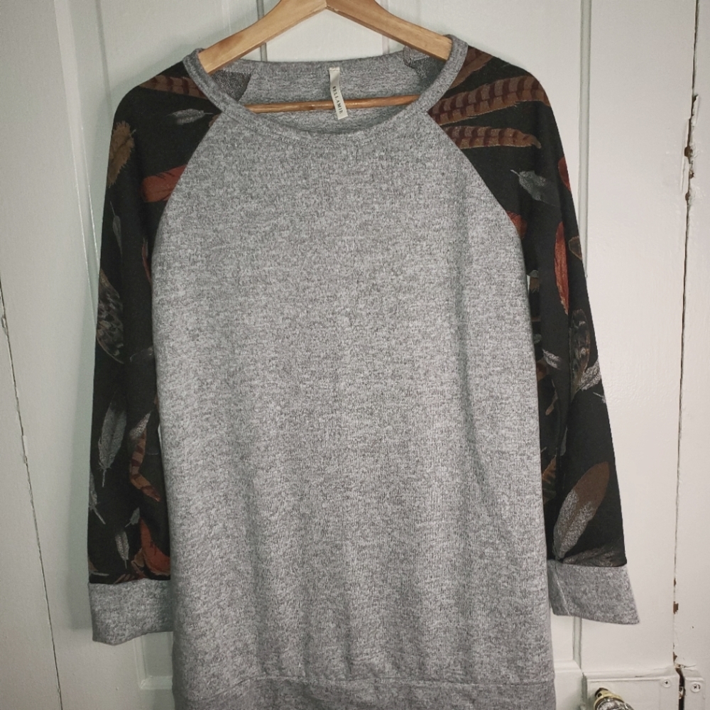 Grey top.